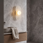 Orthia - Frosted Globe Travertine Sconce