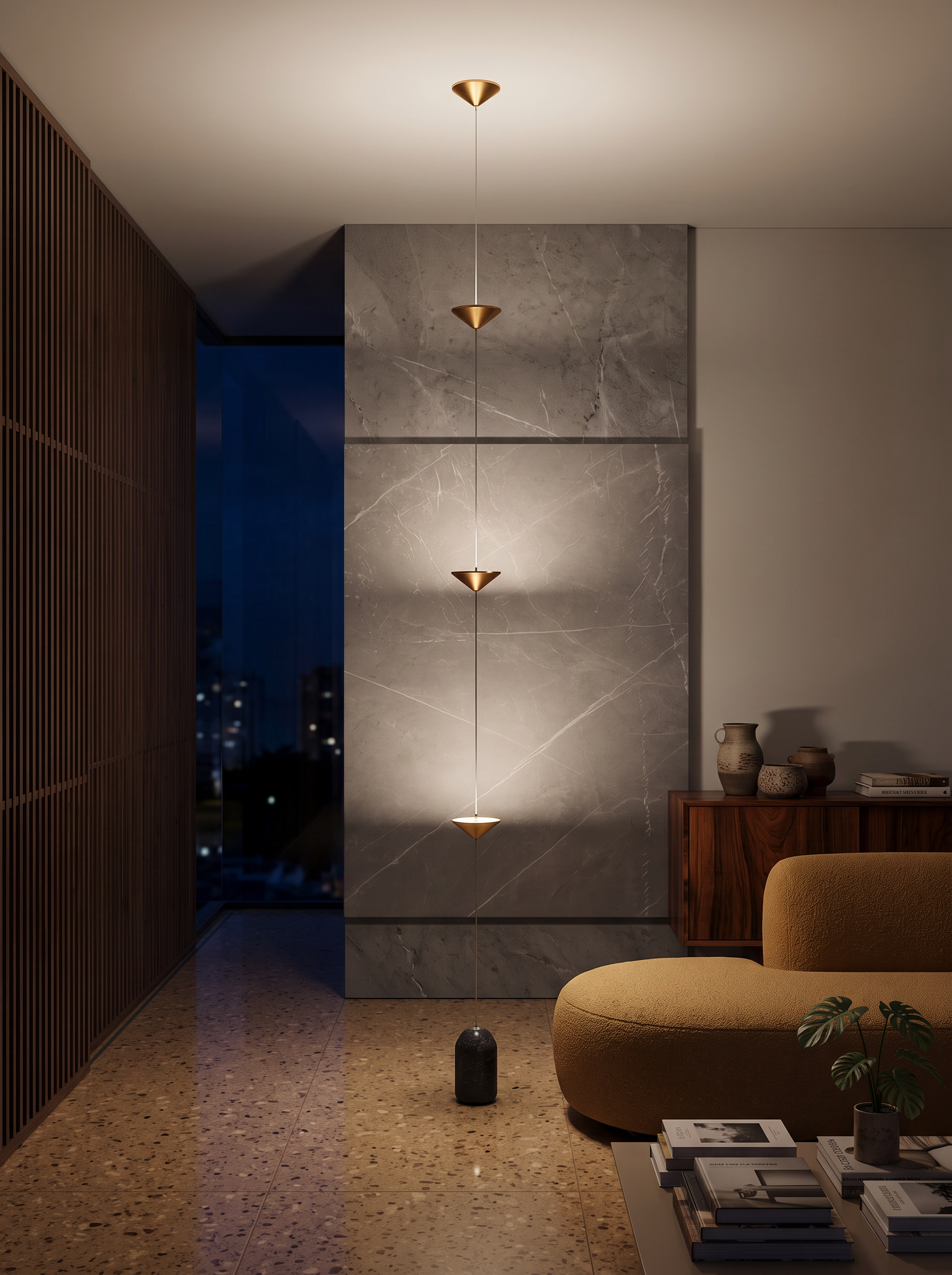 Ouranie tension cable floor lamp as the only light in a living room at night
