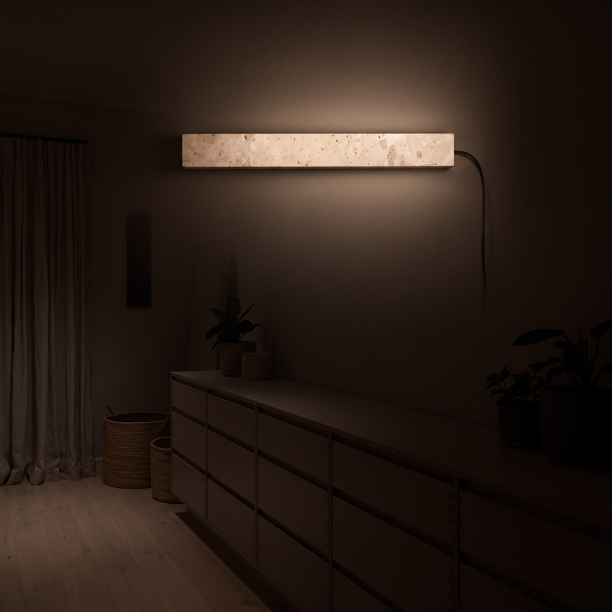 Dynamene Travertine Linear Plug-In Wall Light lit at night in a Perth coastal bungalow dressing area
