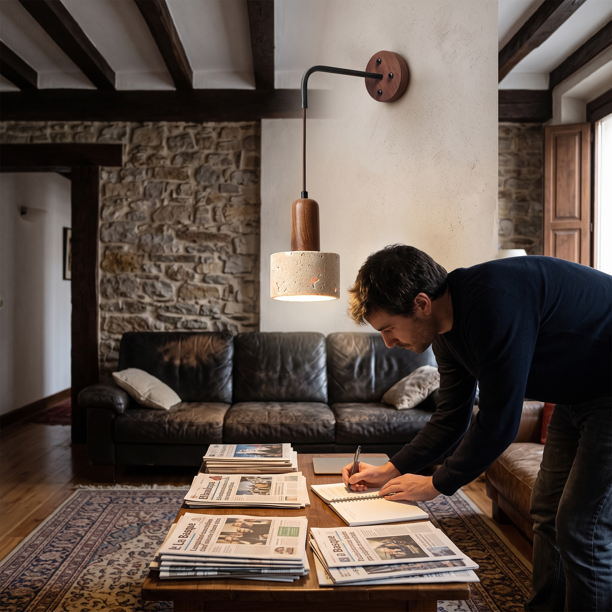 Eurynome Travertine Dome Wall Light lit in a Bilbao Basque townhouse living room