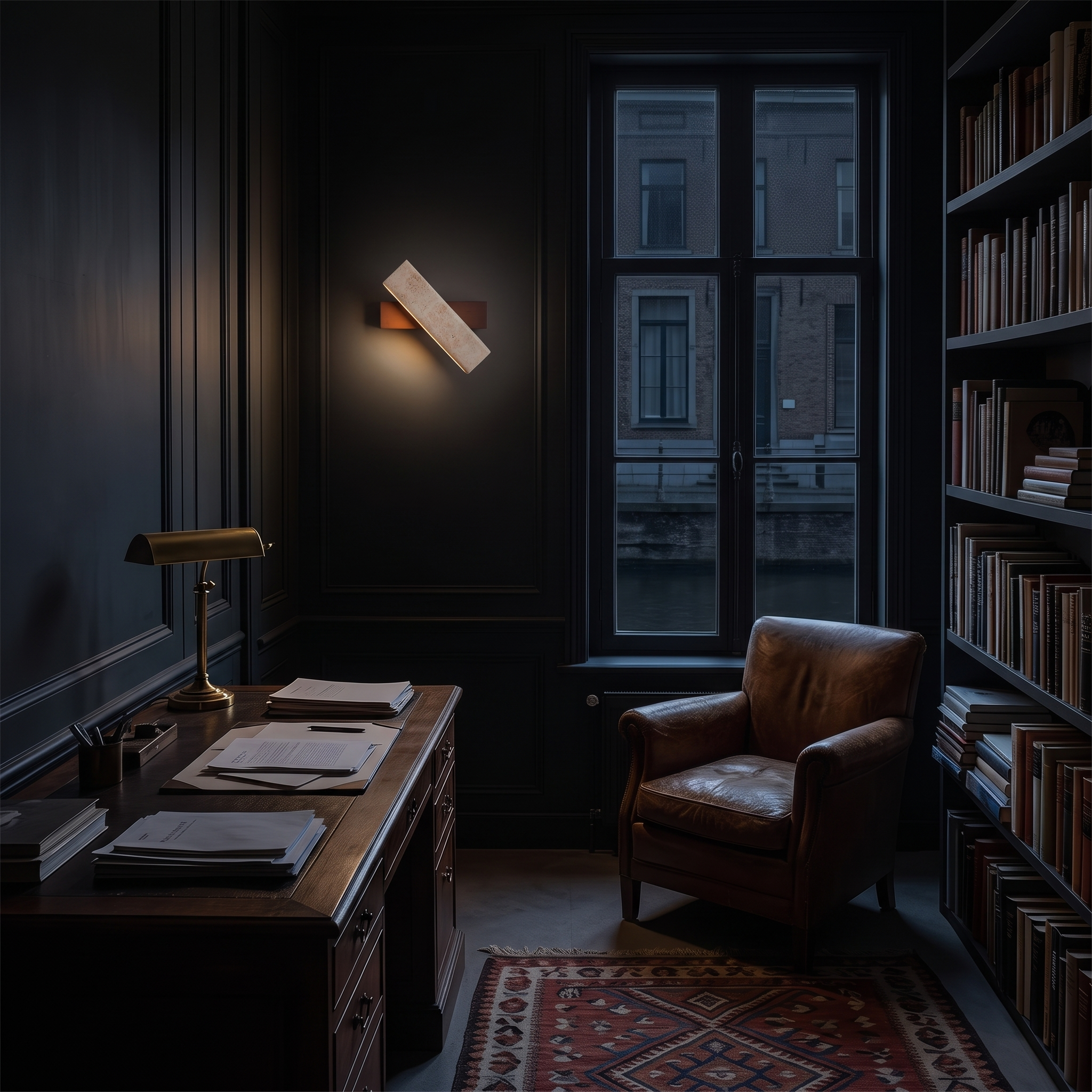 Notos Travertine and Wood Linear Wall Lamp lit at night in a Ghent canal house study