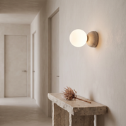 Kepheus - Travertine and Glass Globe Sconce