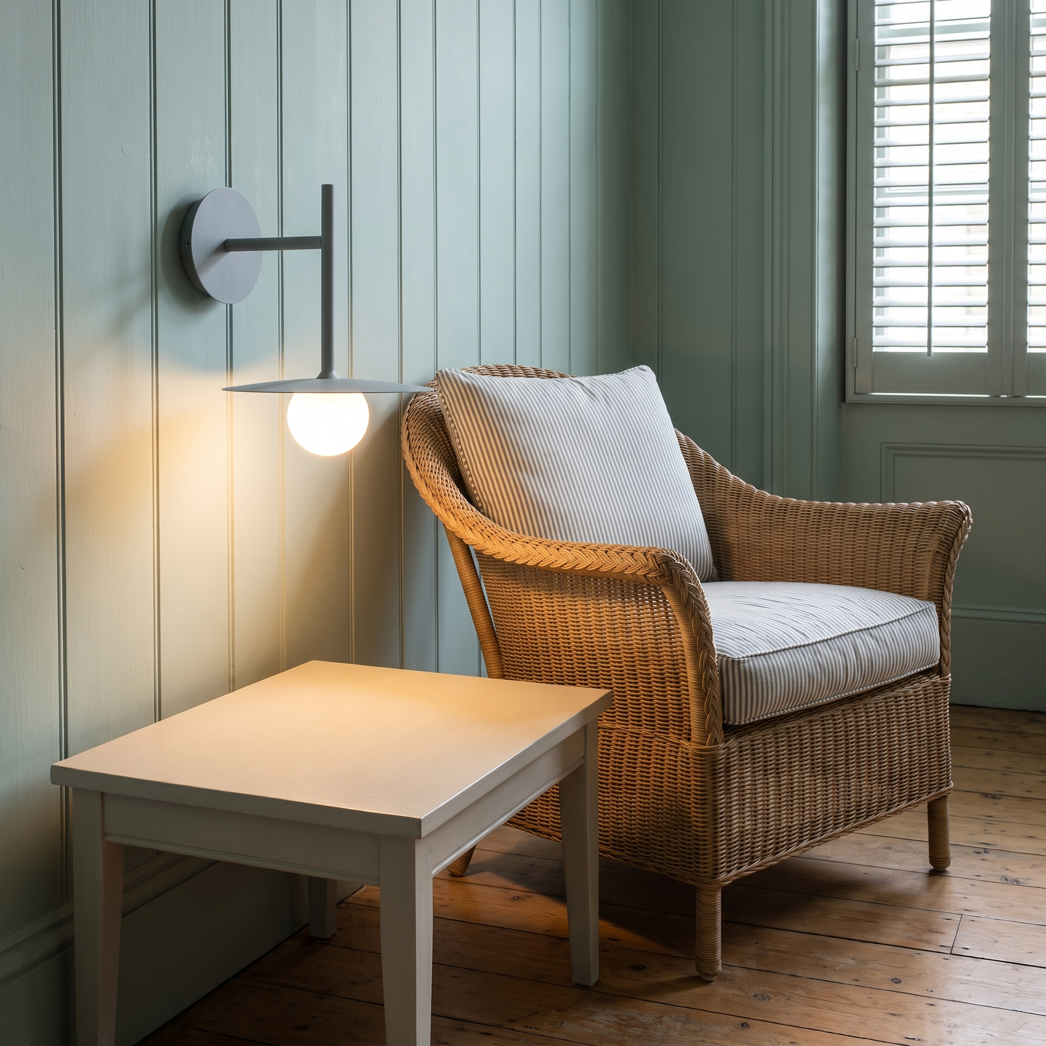 Hesione - Ironwork and Glass Wall Lamp in Gray shown lit in an interior