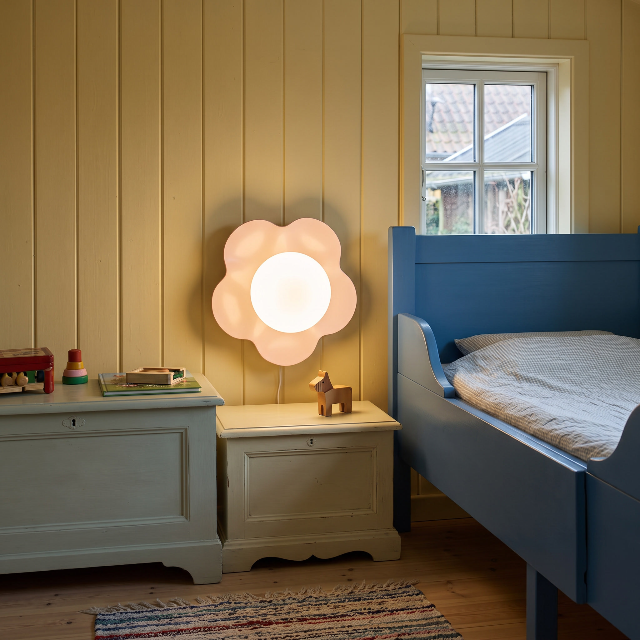 Pheme - Resin and Glass Wall Light in Pink shown lit in an interior