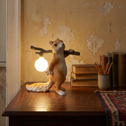 Menippe - Resin Squirrel Table Lamp in a styled interior