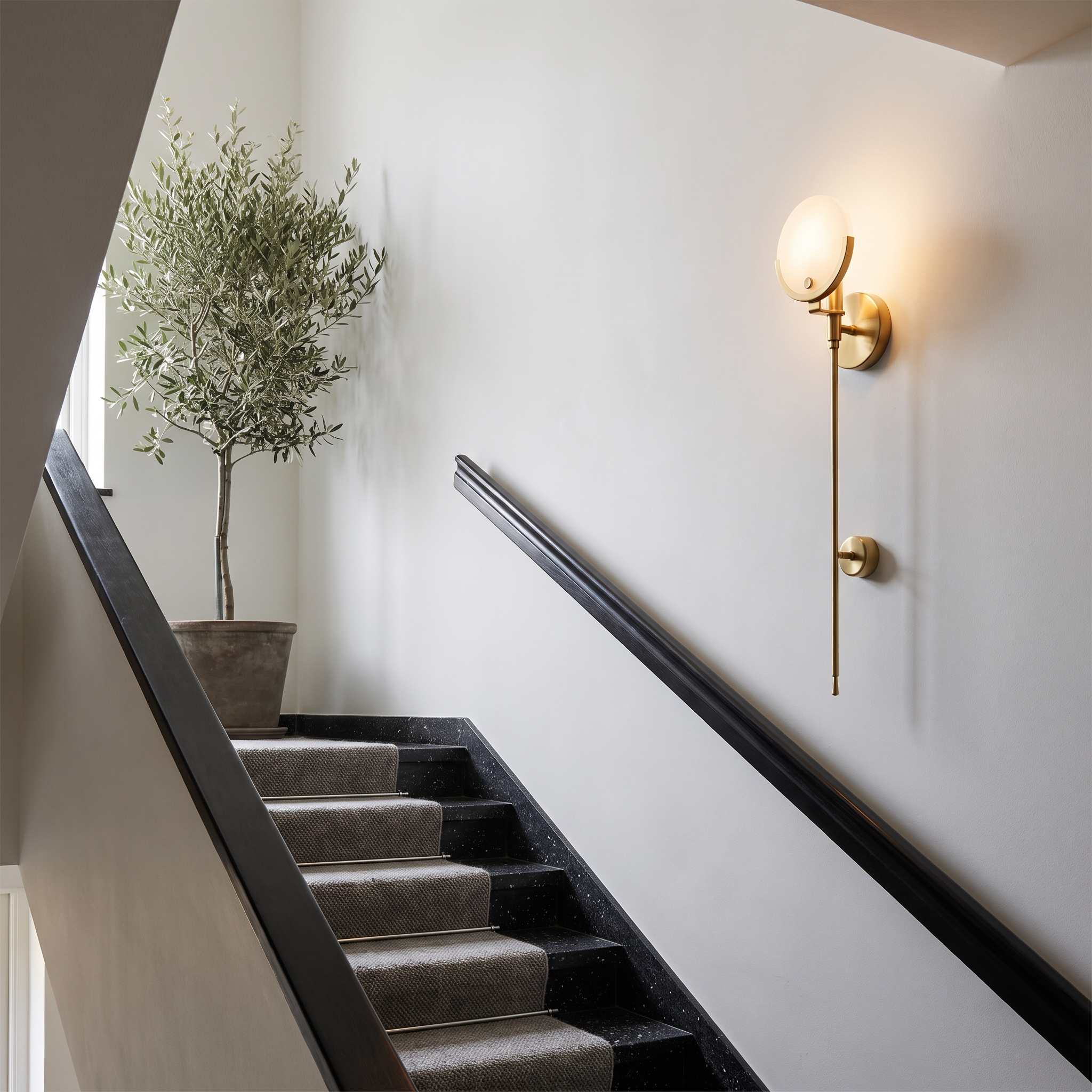 Warner - Alabaster and Brass Wall Lamp in a styled interior