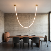 Claude - Flexible Silicone LED Pendant Light in a styled interior