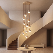 Dewey - Travertine and Glass Pendant Light - 12-Heads: ∅ 19.7″ x H 78.7″ / Wood color & Beige