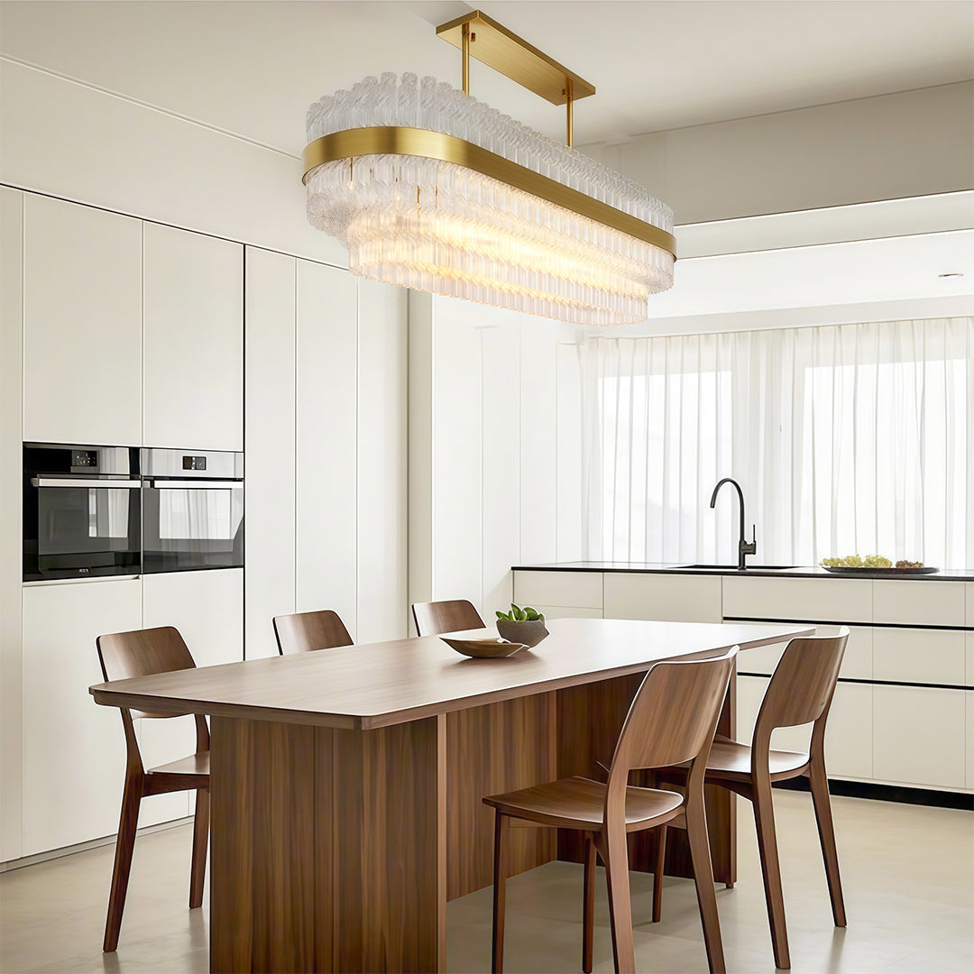 Hermione glass rod chandelier in a bright marble kitchen dining area