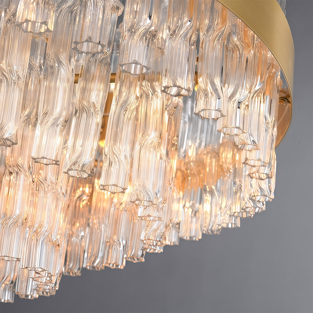 Hermione chandelier close up of the clear glass rods and the metal band that holds them