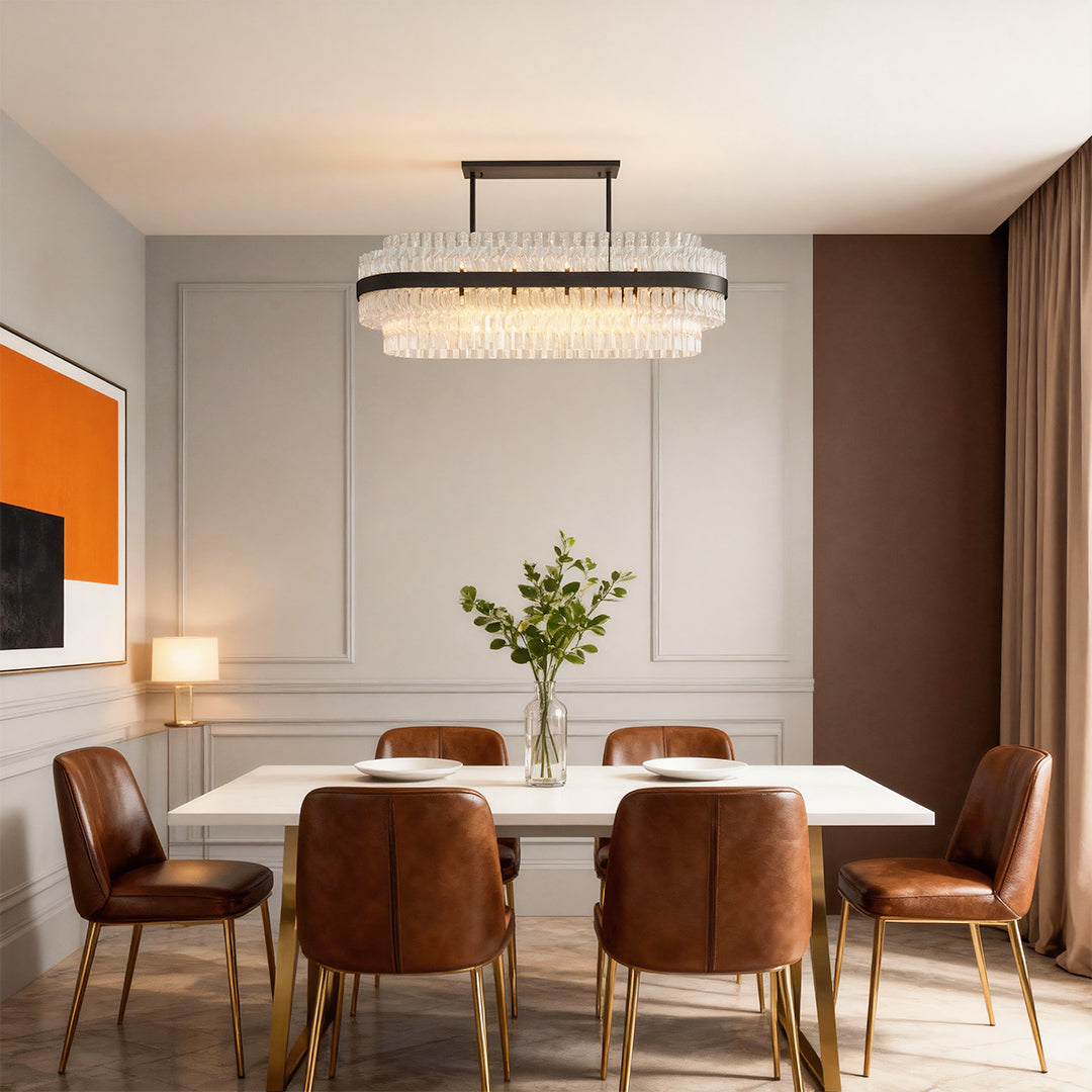 Hermione glass rod chandelier above a spacious dining table with leather chairs